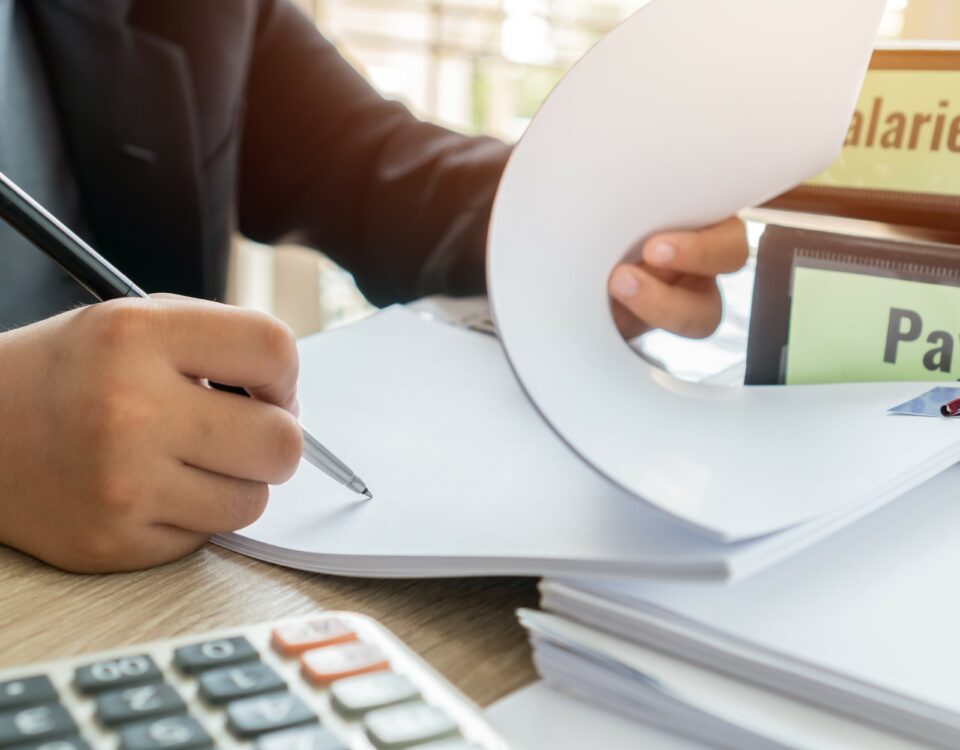 Person making manual calculations.